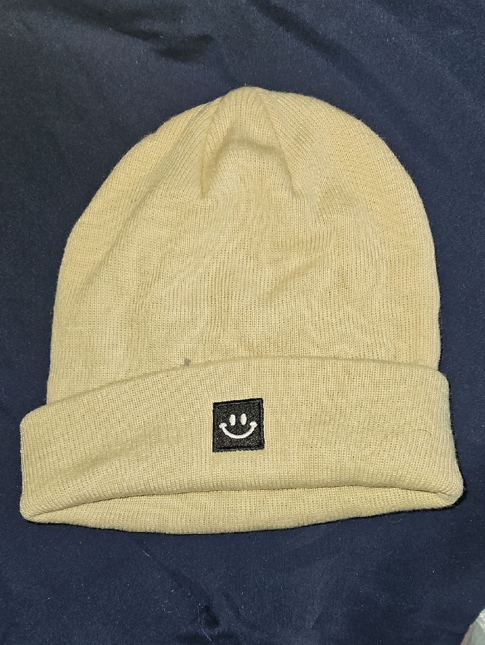 Amazon Tan Beanie Hat with Smiley Patch